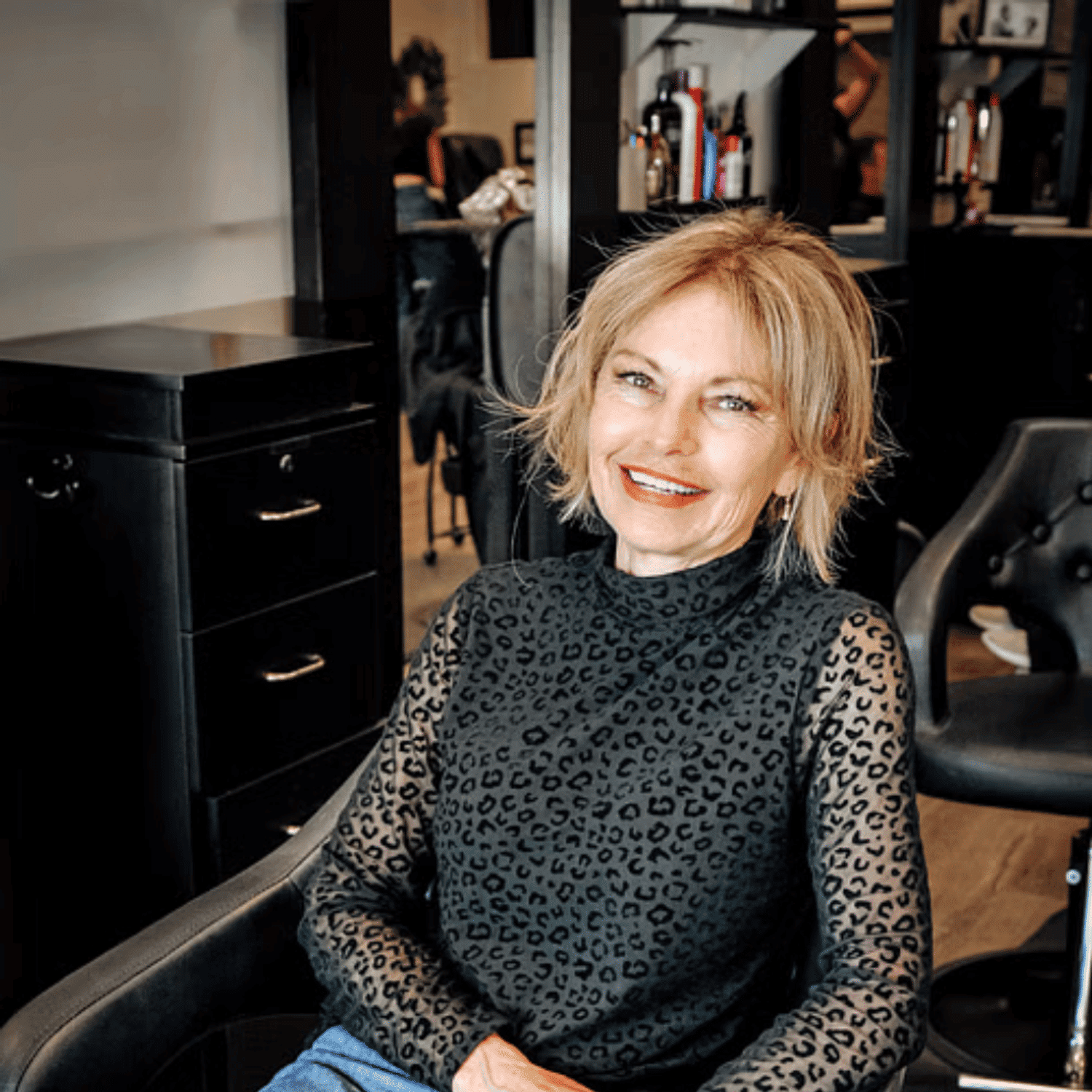 Portrait of Jeanette, a professional stylist at D & S Styling, showcasing their expertise and style.