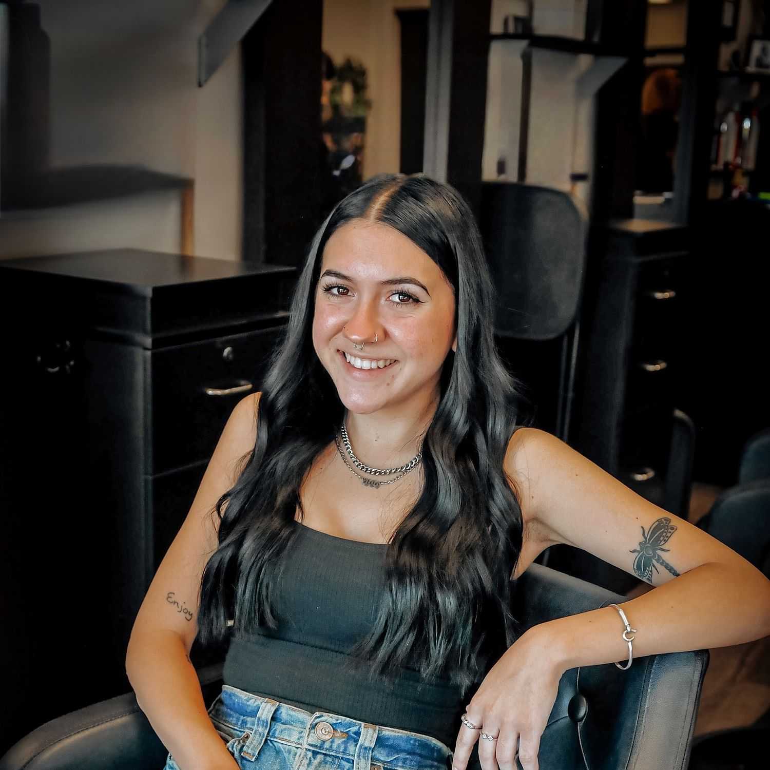 Portrait of Jamie, a professional stylist at D & S Styling, showcasing their expertise and style.