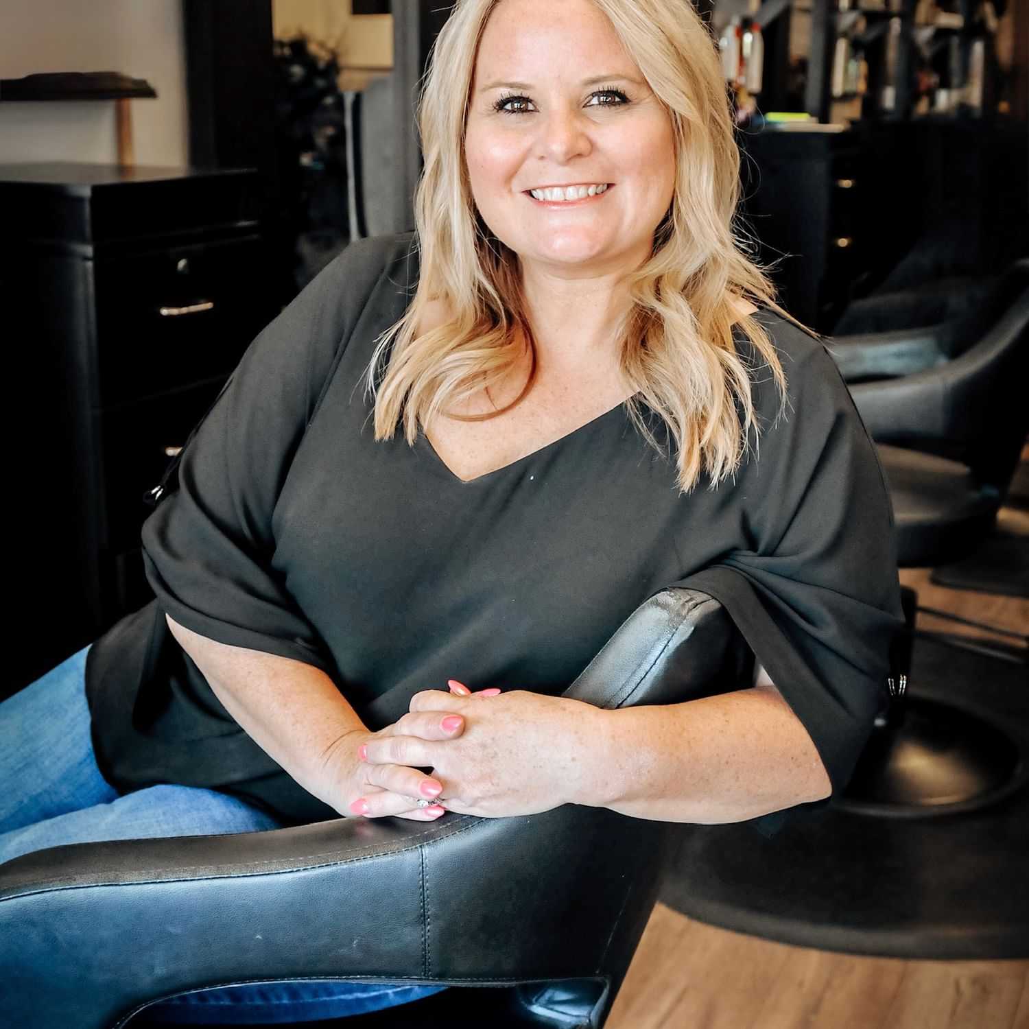 Portrait of Becky, a professional stylist at D & S Styling, showcasing their expertise and style.