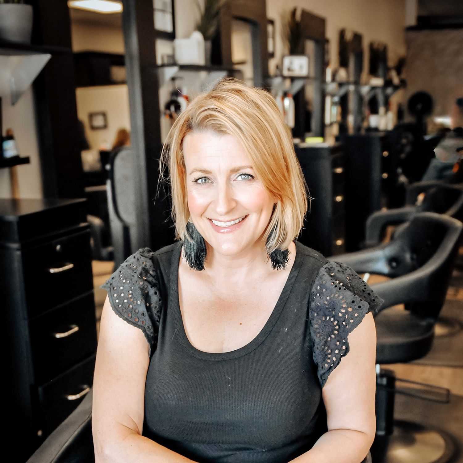 Portrait of Laura, a professional stylist at D & S Styling, showcasing their expertise and style.