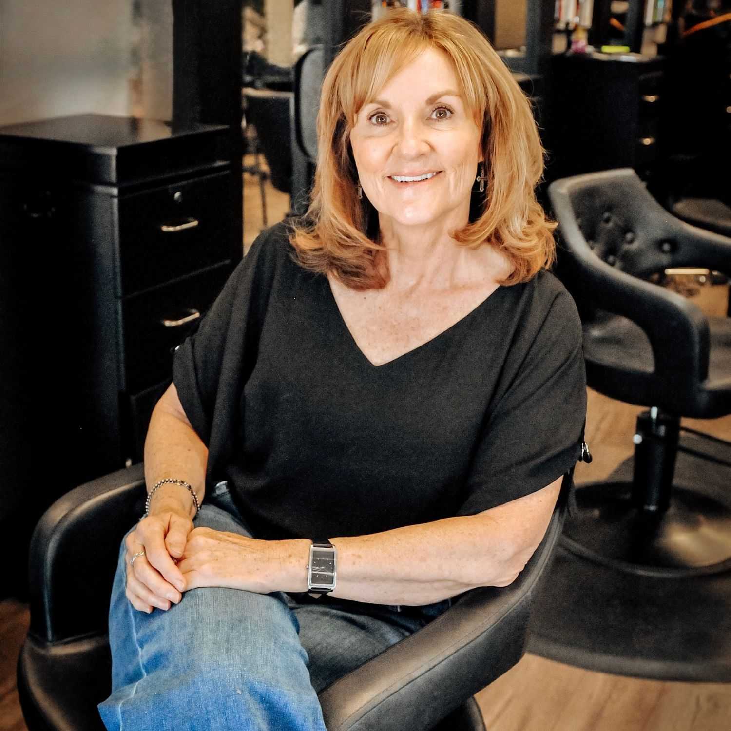 Portrait of Liz, a professional stylist at D & S Styling, showcasing their expertise and style.